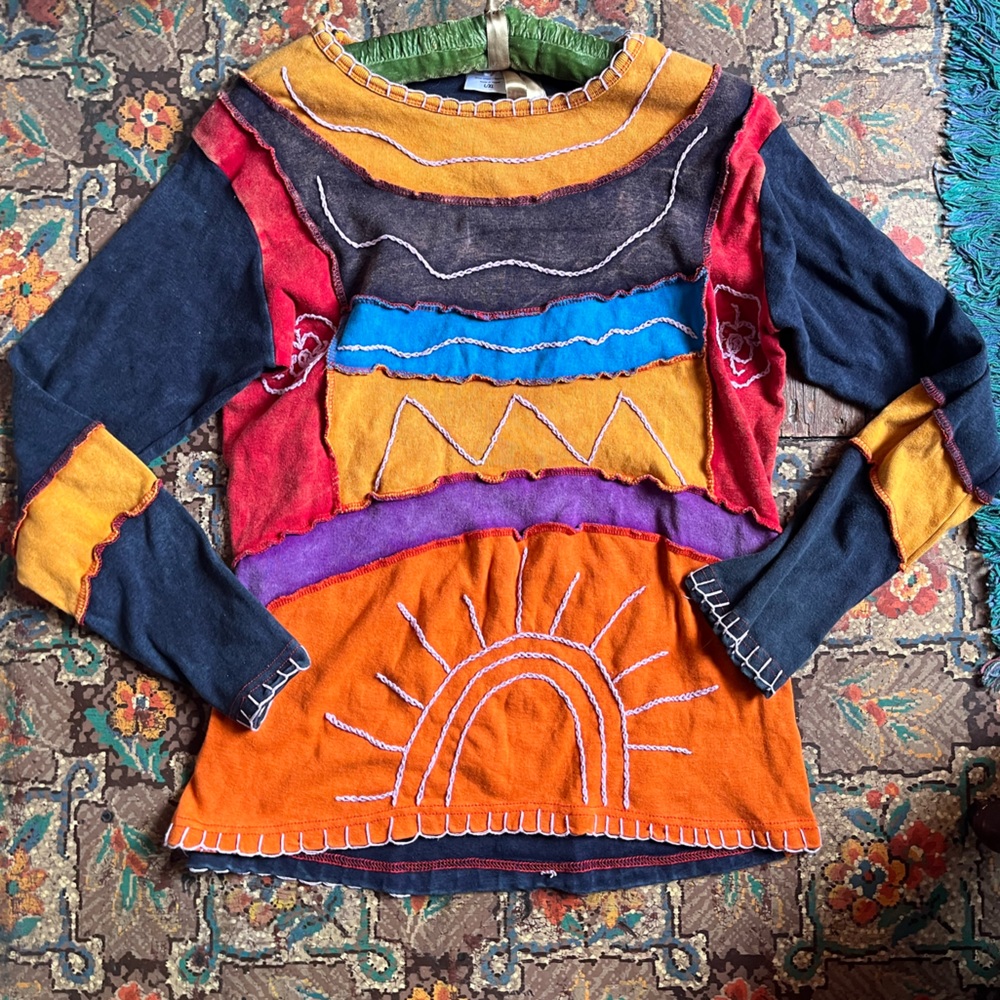 Rising international x-large long sleeve tee.